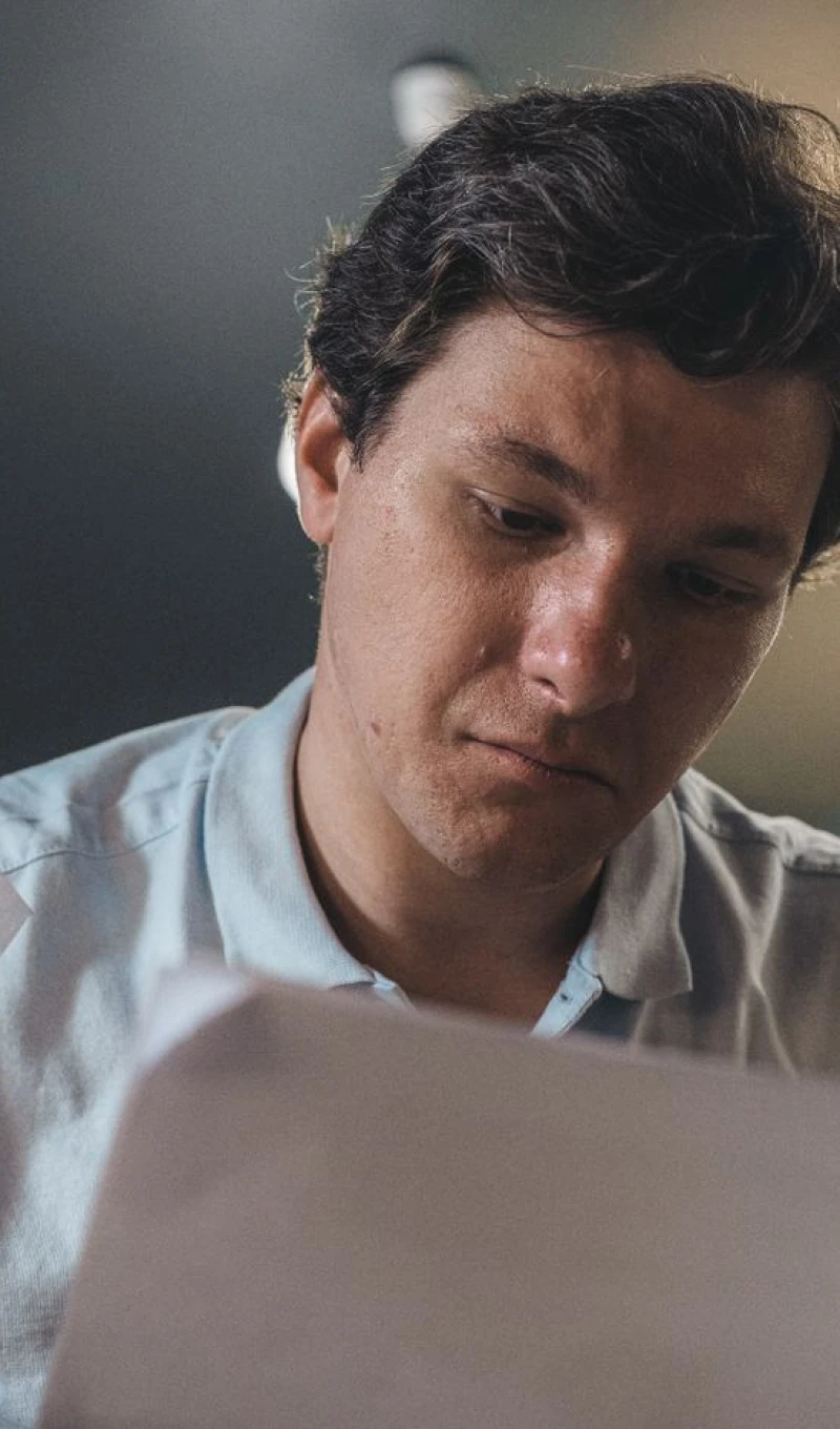 A business owner reading the printed health check report